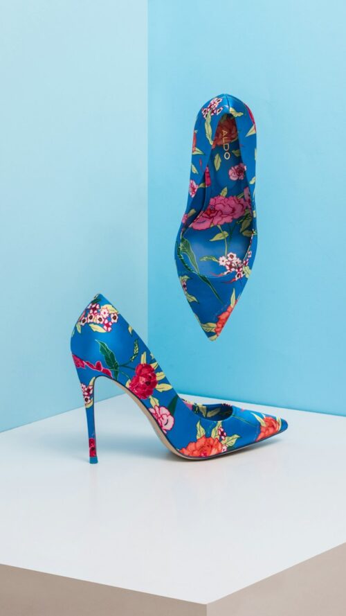 pair of blue-and-pink floral almond-toe pumps